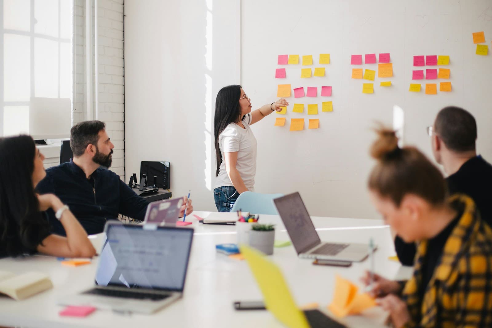 Team collaborating on strategy in a modern office