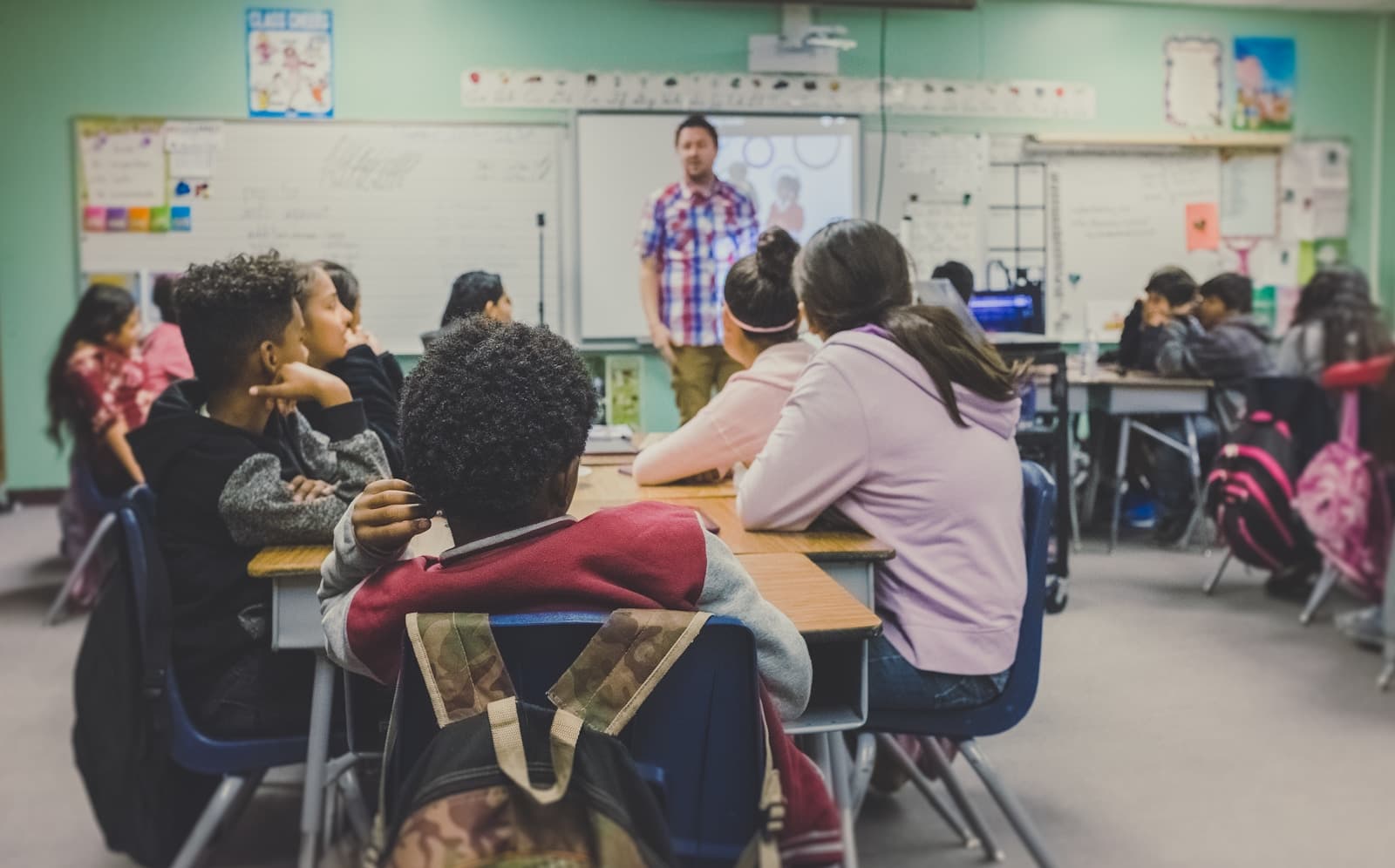 Students learning together in a classroom setting