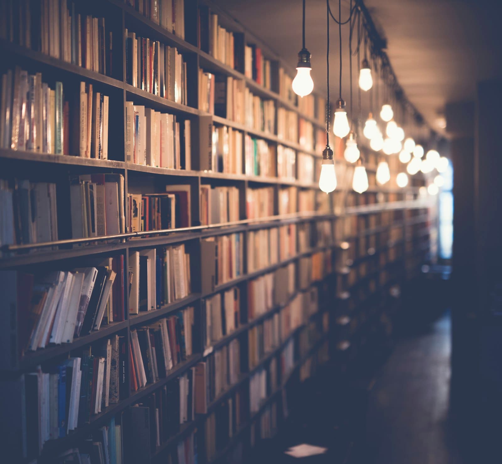 Academic library shelves — research and higher-education support